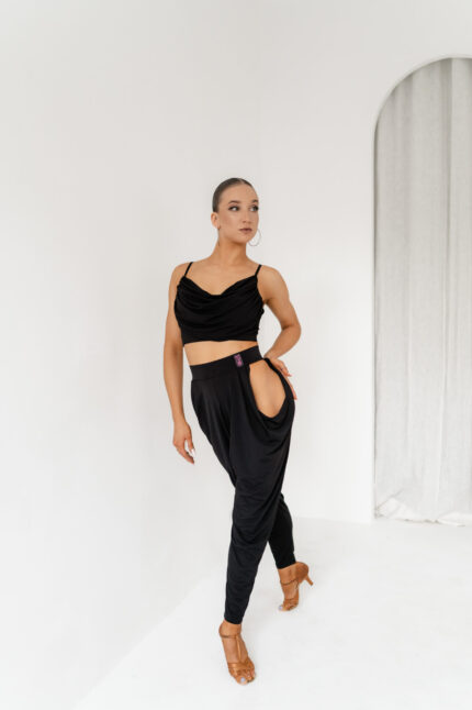 Stylish Latin dance pants with hip cutouts, high waist, and made from flexible jersey fabric.