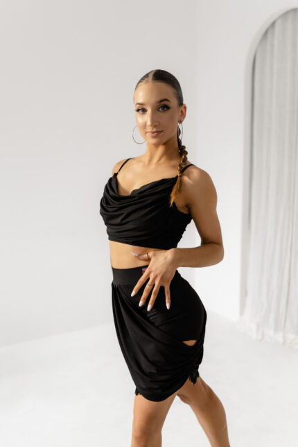 Latin dance skirt with fringes and decorative trim.