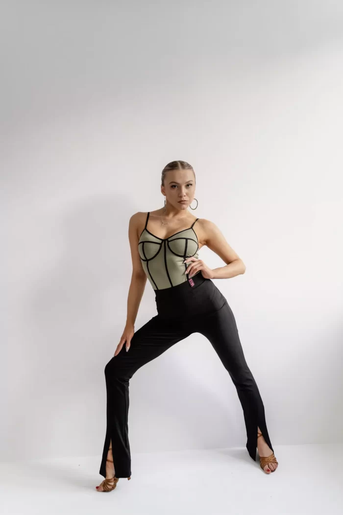 Stretchable dance pants made from soft fabric, perfect for European and Latin dance styles, featuring romantic cut-outs.